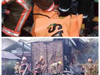 Petugas pemadam kebakaran berusaha memadamkan api yang melalap rumah Jamhuri Hasan di Jalan Perintis Kemerdekaan Gang Banda Neira, Banjarmasin Tengah.